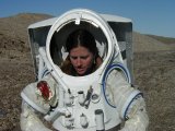 Dr. Kelly Snook tests out a Mars prototype suit