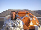 Gordon Osinski tries out a Mars prototype suit