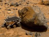 The Sojourner rover examining a rock